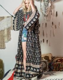 This season’s maxi kimono is a flowing, gypsy dream in our Bohemian Royale print of smokey charcoal hues and floral flecks of cream & chocolate. With classic, draping kimono sleeves and a floor-kissing hem, it's perfect dressed down over denim cut offs and a rocker tee at a festival. Or pack it as your holiday essential for poolside lounging or simply wear it flowing around the house over your Spell intimates.